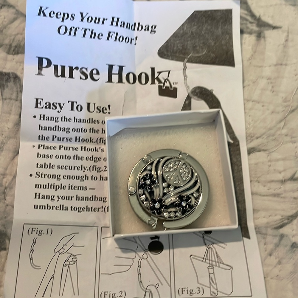 Handbag hook..to keep off the floor